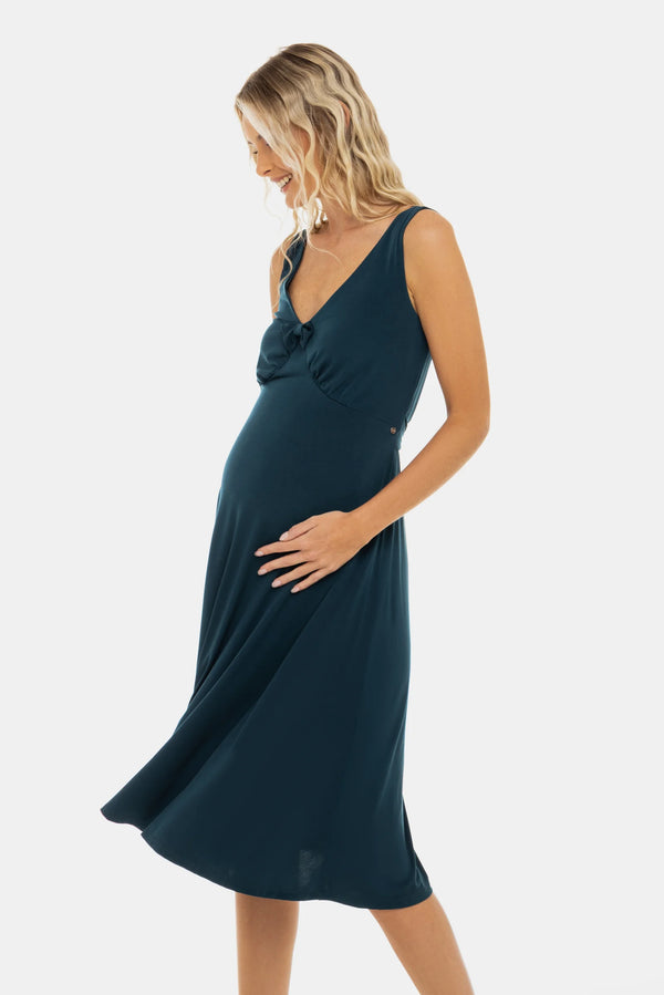 Luchtige zwangerschapsjurk met plooien en strikdetail – teal