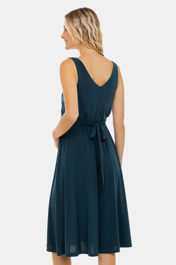 Luchtige zwangerschapsjurk met plooien en strikdetail – teal
