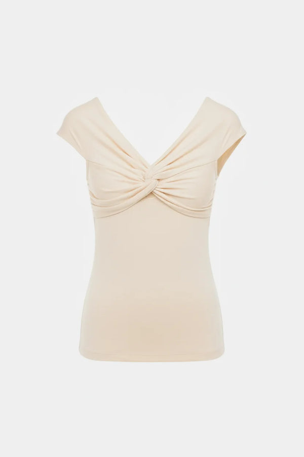 Elegante zwangerschapsblouse met knoopdetail – ivoor