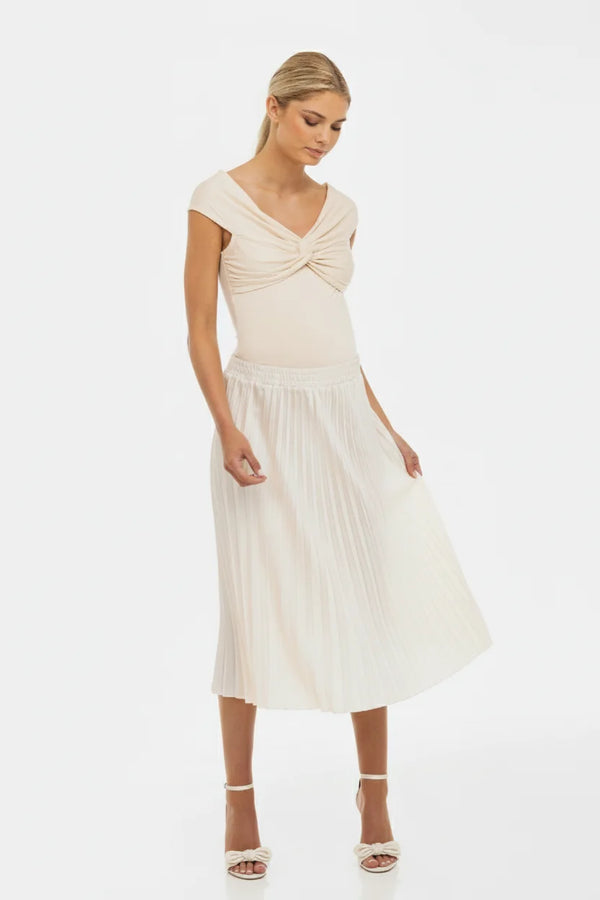 Elegante zwangerschapsblouse met knoopdetail – ivoor